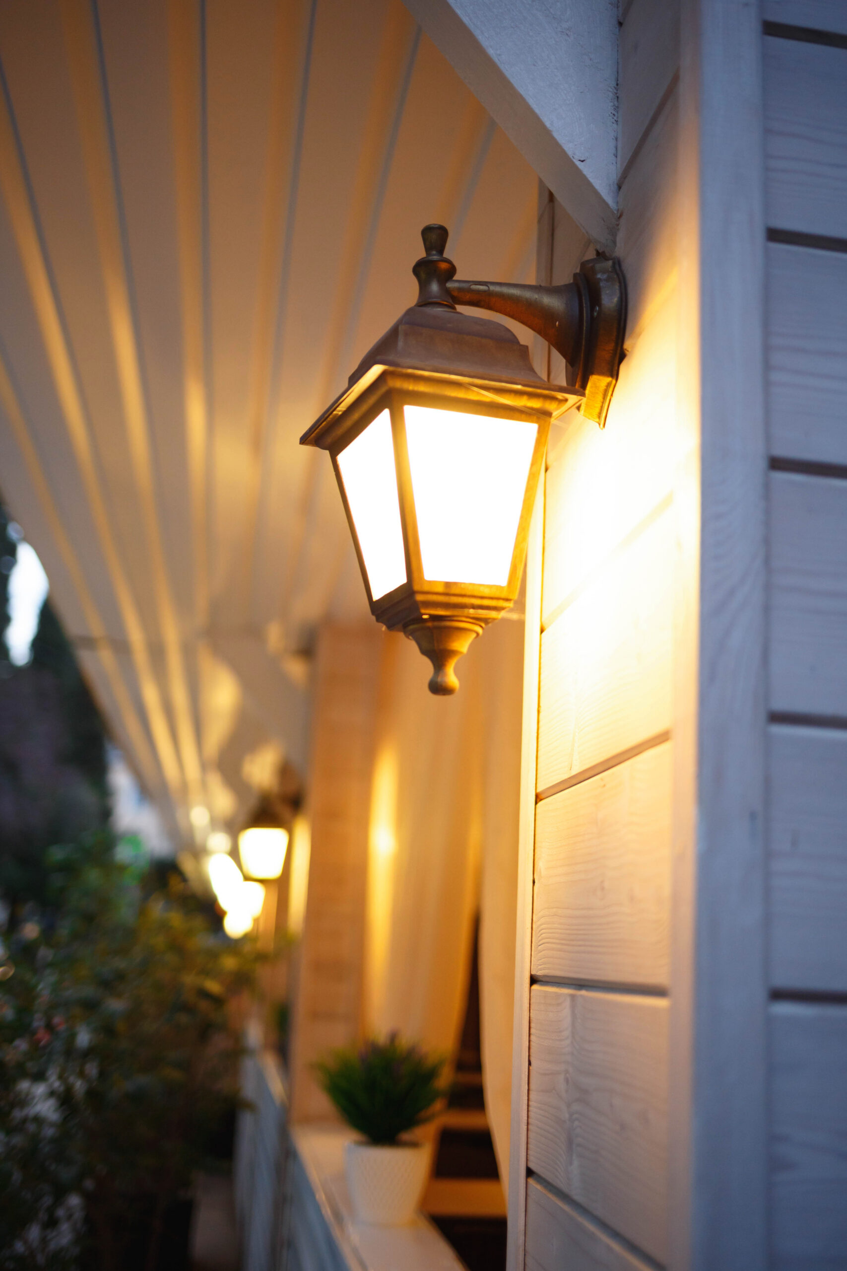 illuminated lantern on wooden wall at night 2026 03 13 01 59 13 utc